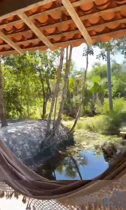 O riacho visto da rede — Chalé Água-Pé, Sítio Bambu Rede