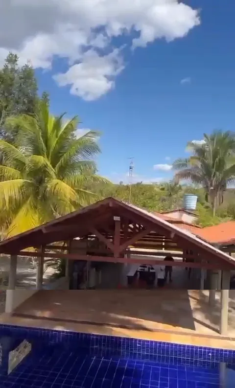 A piscina vista do deck do chalé — Chalé Babaçu, Sítio Bambu Rede